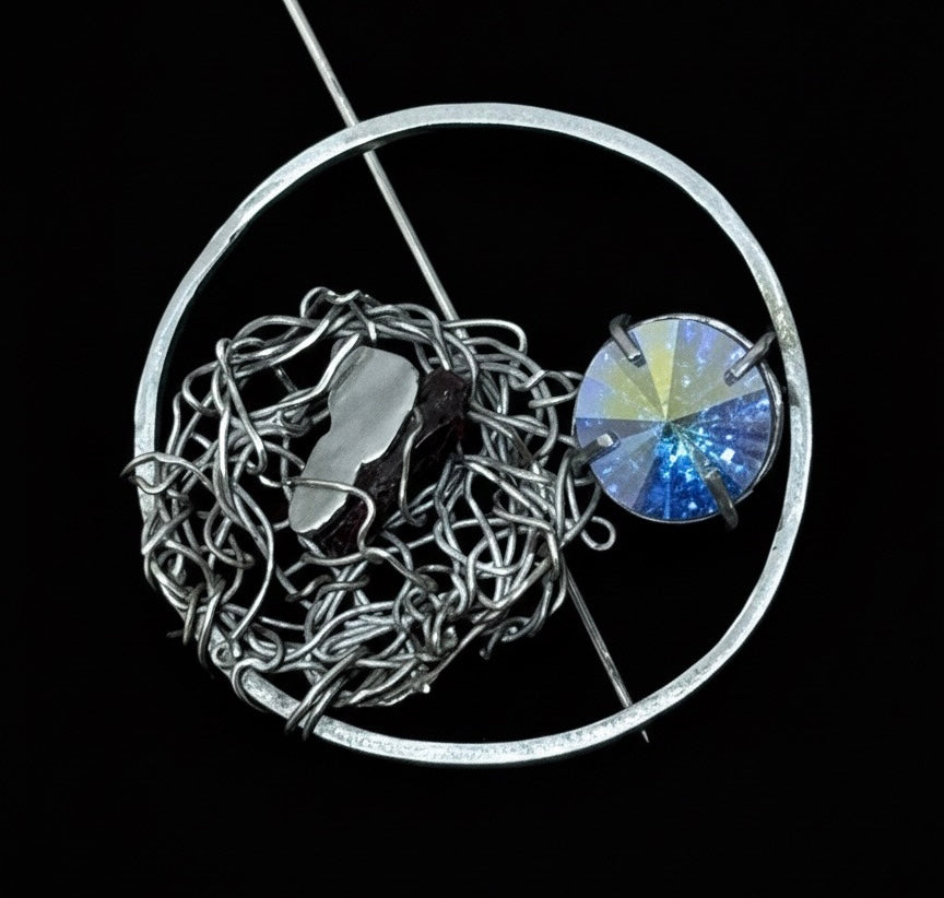 Broche Luz de UCI