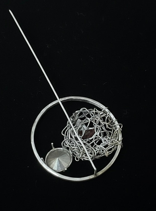 Broche Luz de UCI